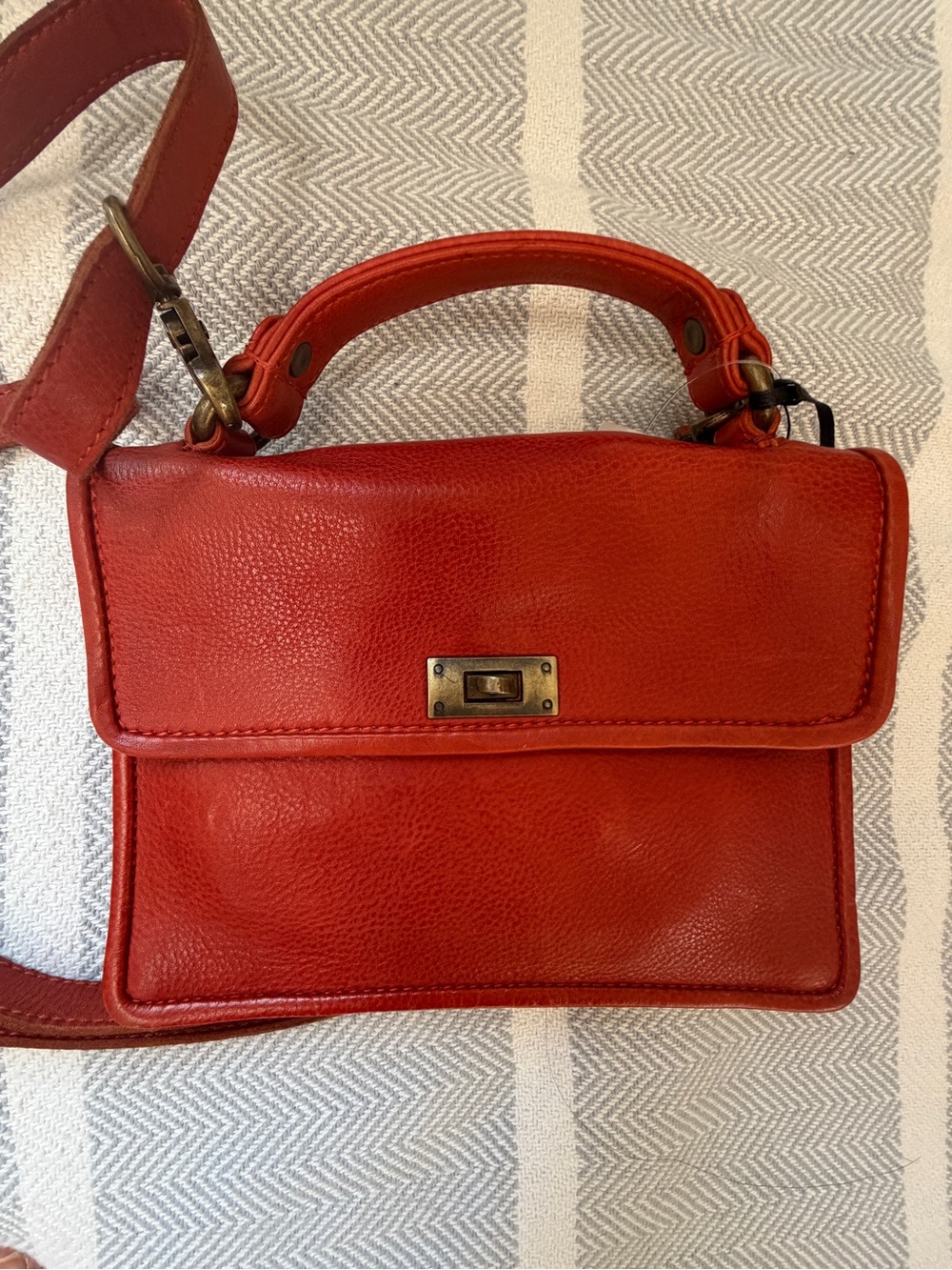 New latico orange full grain leather crossbody bag